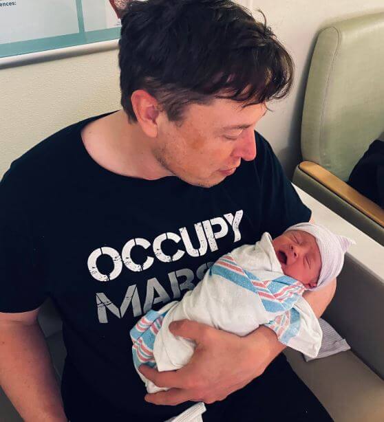 Elon musk with his baby boy.